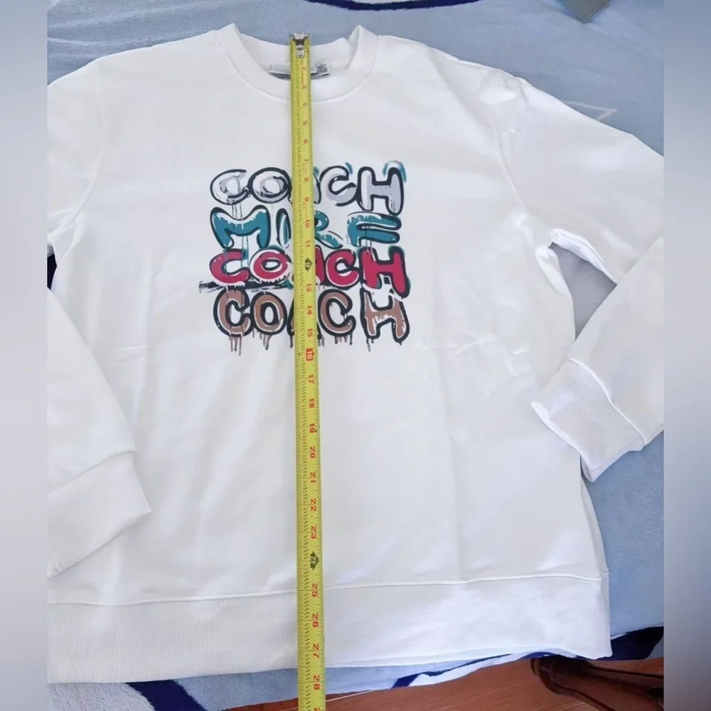 Coach women’s multi Sweatshirt‎ L